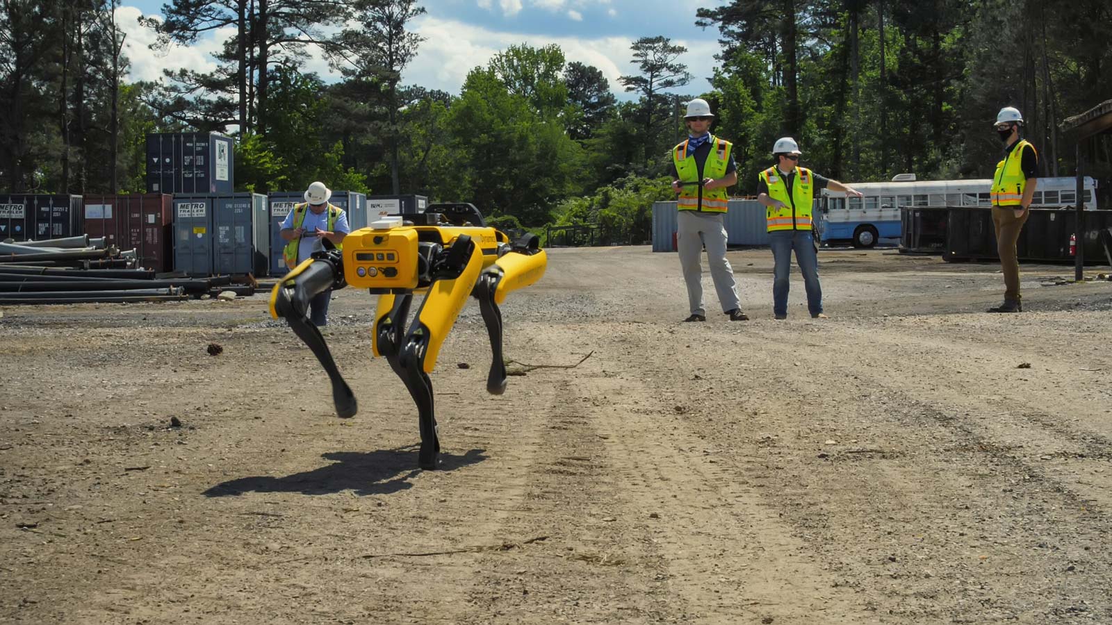 Employees controlling robot